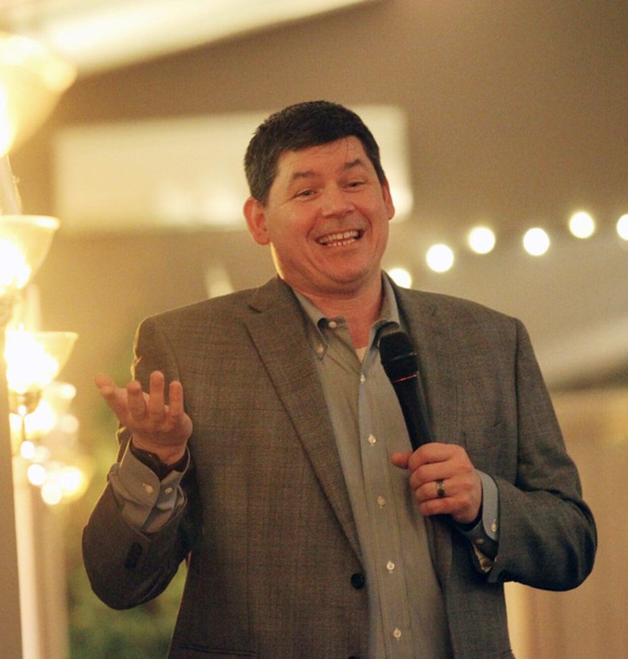 Corporate Comedian Dan Deibert talking to a group.